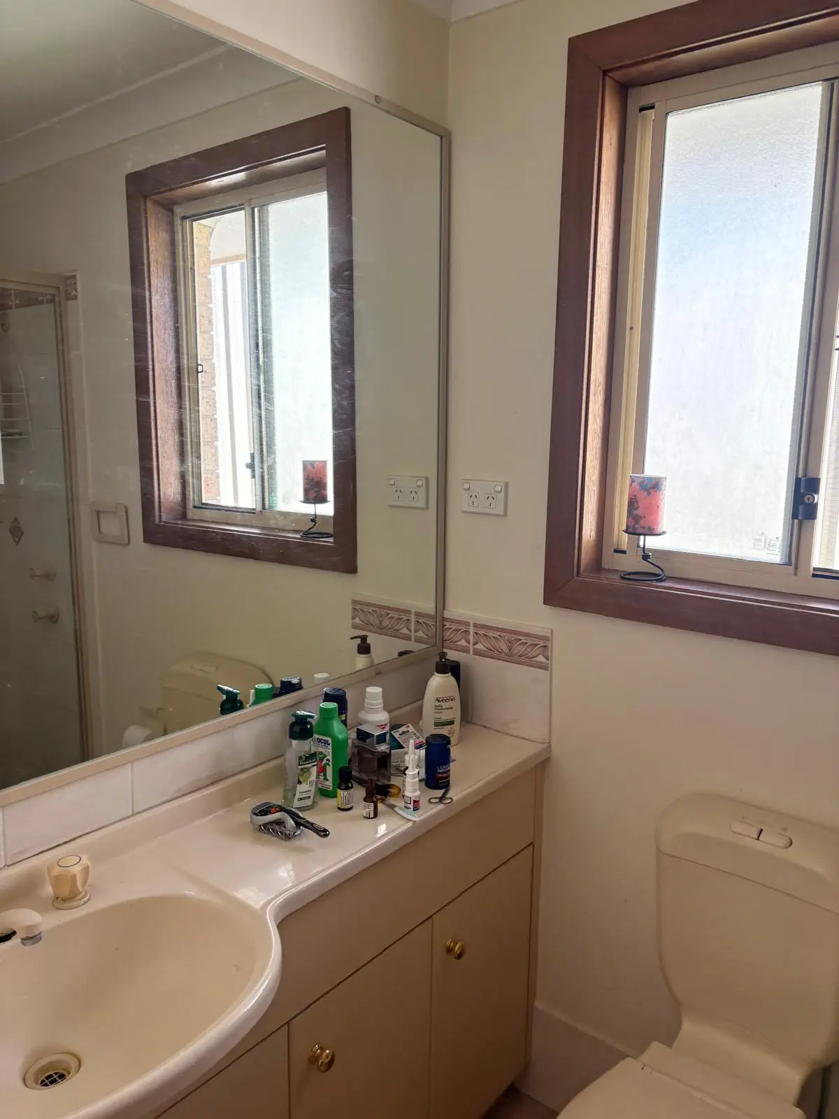 Tired long-term rental — the dated bathroom before refresh